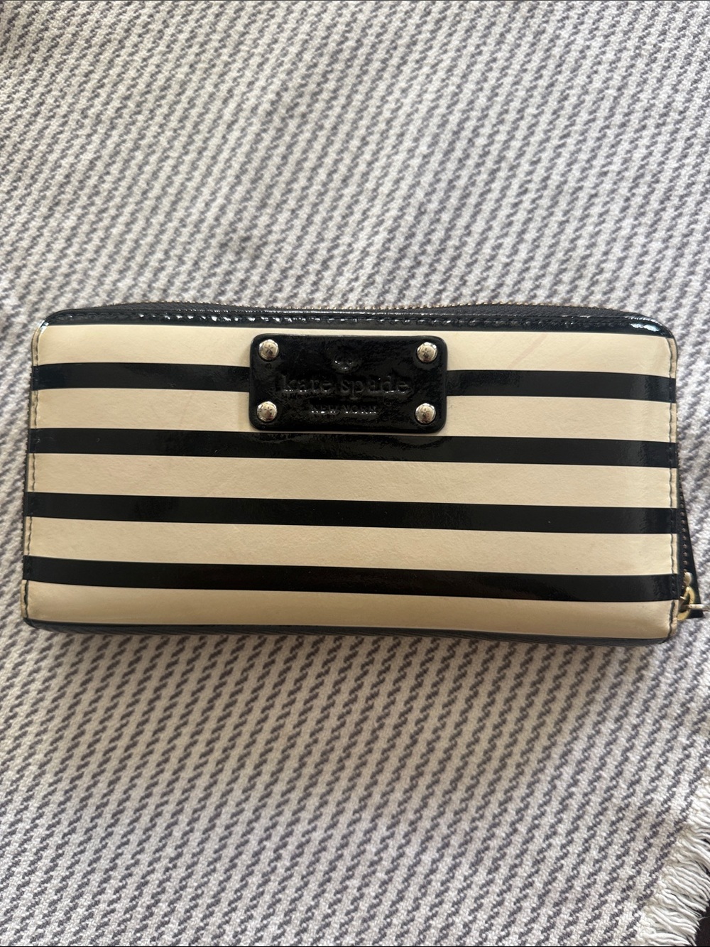 kate spade Black and White Striped Patent Zip Wallet